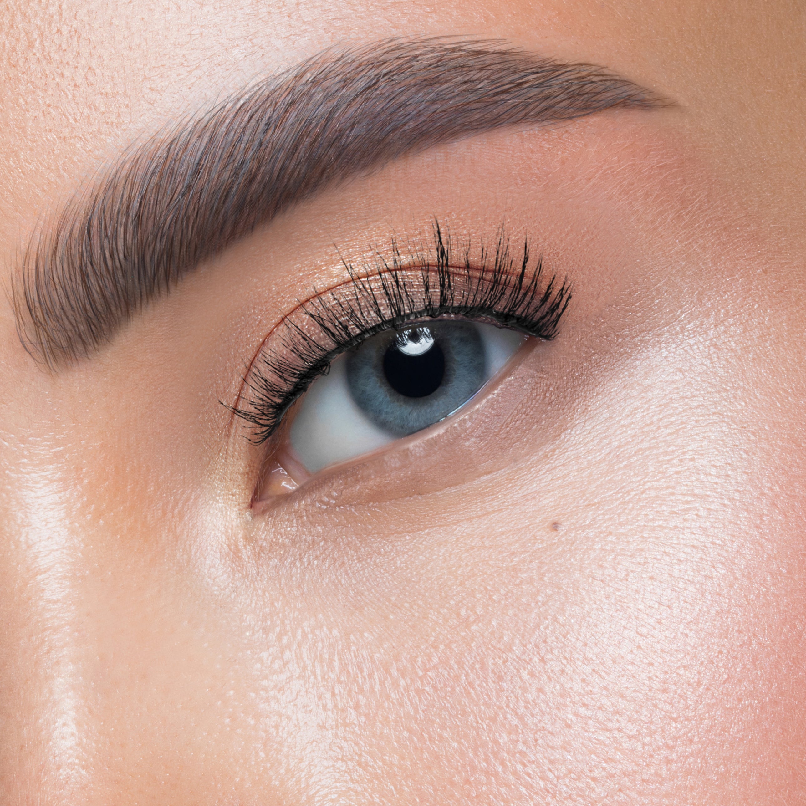 doll eye lashes, doll eye false lashes, natural strip lashes, natural but fluffy strip lashes, doll eye strip lashes, fluffy lashes, vegan lash strips, strip lashes, false eyelashes, natural strip lash look, high quality strip lashes, volume style strip lashes, luxurious strip lashes, Biodegradable lashes