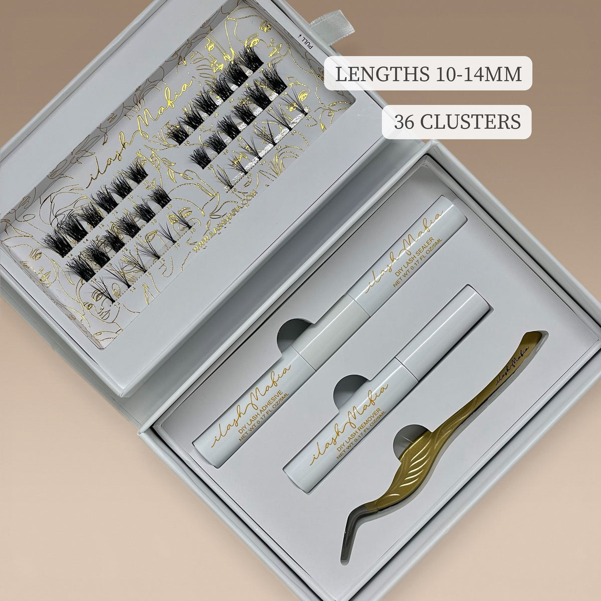 iLash Mafia Cat Eye DIY Lash Extension Kit with 36 lash clusters in 10–14mm lengths, lash adhesive, sealer, remover, and gold lash applicator.