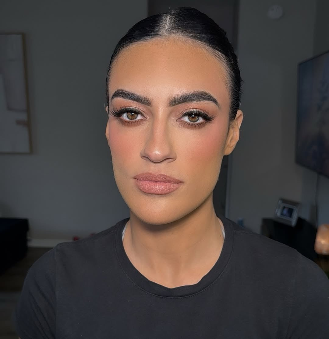 Model wearing iLash Mafia BUSSIN DIY lash extensions featuring soft volume, fluffy texture, wispy definition, and a natural eye-enhancing effect. Finished at-home lash extension look with lightweight fullness and everyday glam styling.